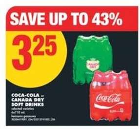 COCA-COLA or CANADA DRY SOFT DRINKS