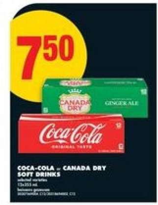 COCA-COLA or CANADA DRY SOFT DRINKS